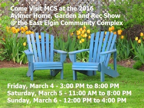 Blue wooden lawn chairs in the spring garden.